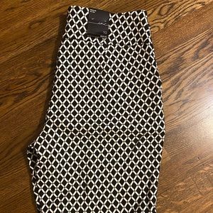 INC black & white Bermuda length pull on shorts.